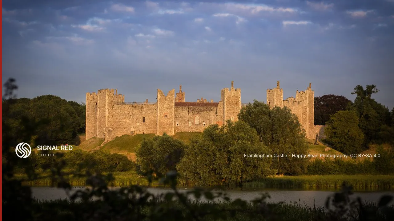 Framlingham Castle at sunset across the mere